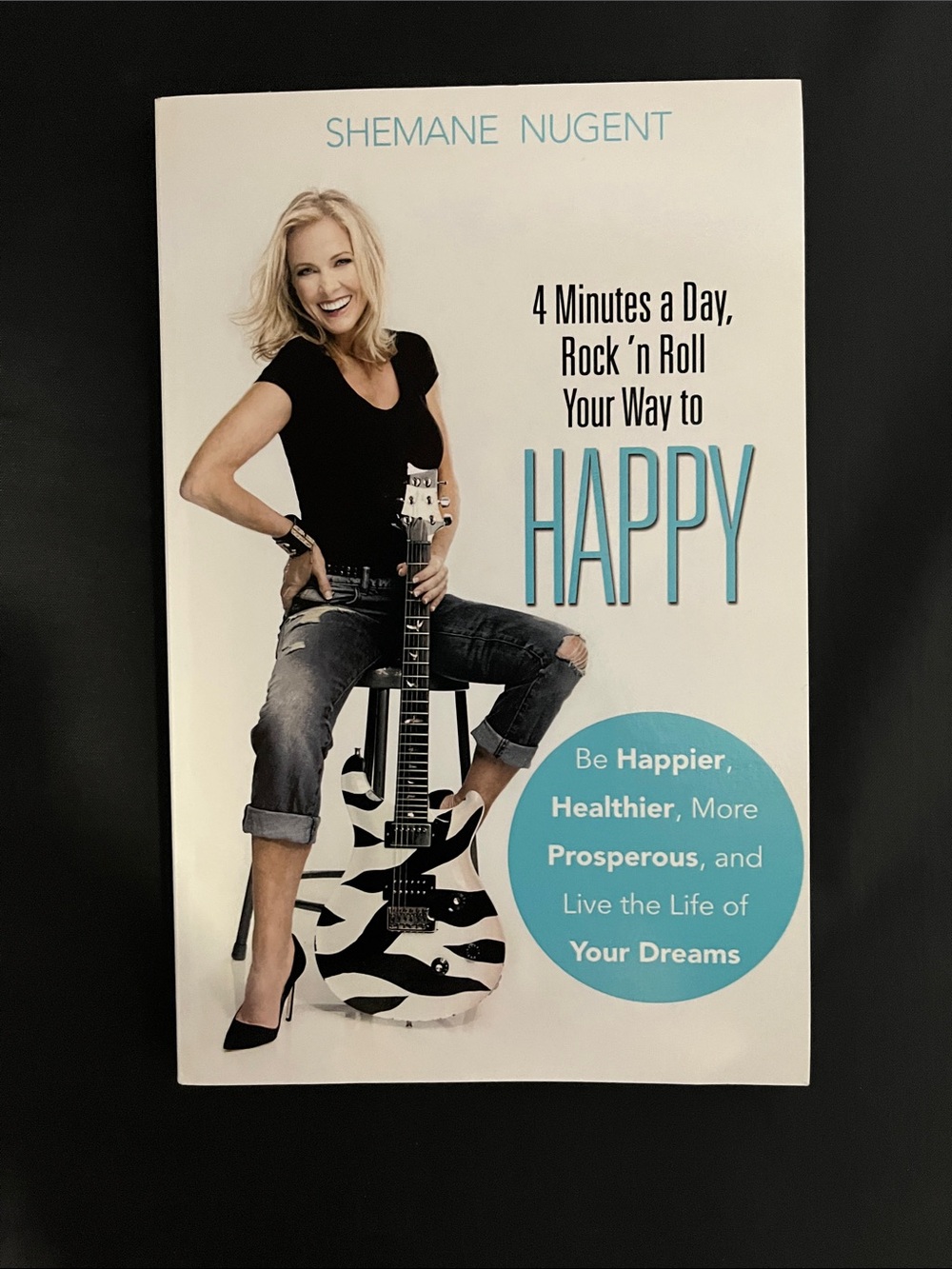 Happy. 4 minutes a day by Shemane Nugent